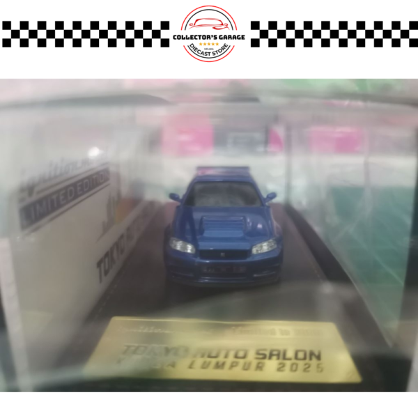 IG3838 (6) IGNITION MODEL 1/64 NISSAN SKYLINE GT-R R34 V-SPEC II BLUE METALLIC (TOKYO AUTO SALON KUALA LUMPUR 2025 EXCLUSIVE)
